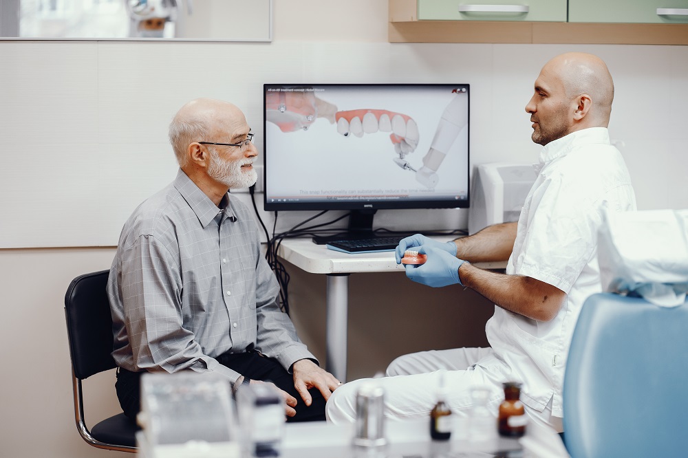 Dental Implants vs. Dentures